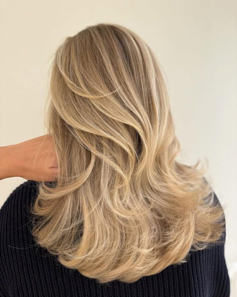 Coupe dégradée femme avec balayage